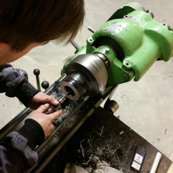 Jesse making prototype pistons.